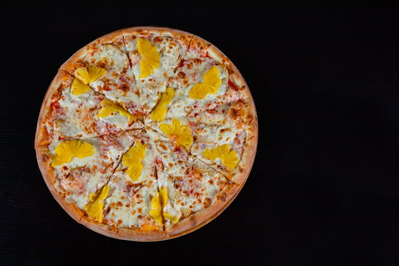 Hawaiian pizza with pineapple and ham